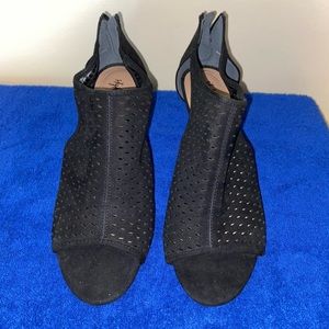 Black peep-toe mesh heels